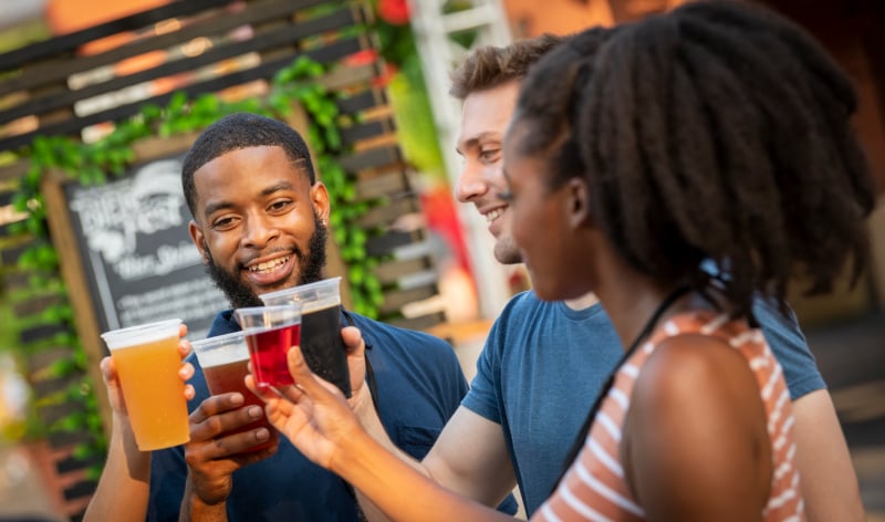 A group of people with beer