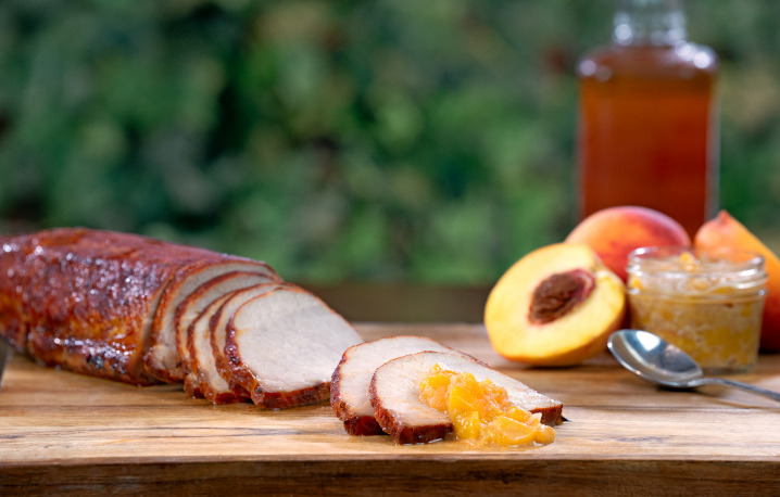 BBQ Dry Rubbed Pork Loin served with a peach bourbon chutney