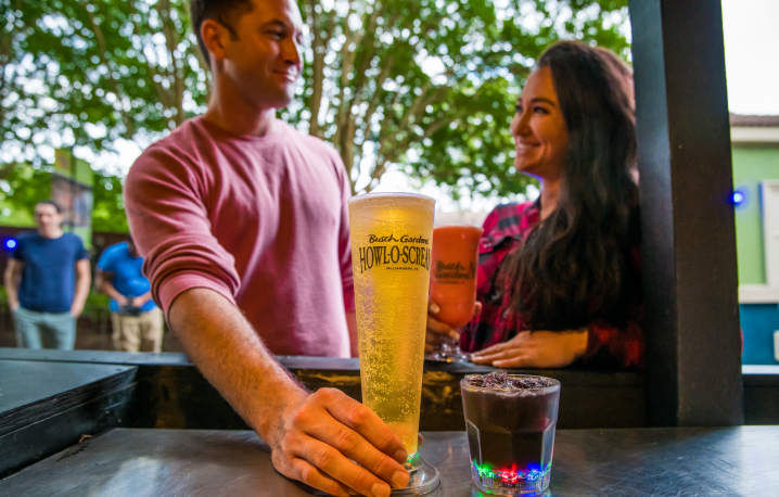 Man and woman with a beer
