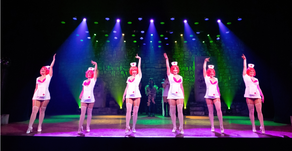 6 Halloween performers in nurses costumes