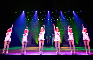 6 Halloween performers in nurses costumes